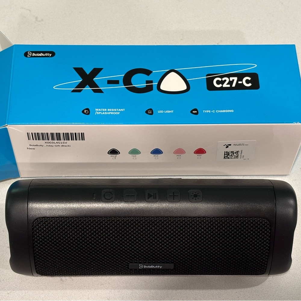 Black Portable Speaker with Wireless Connectivity and Durable Design